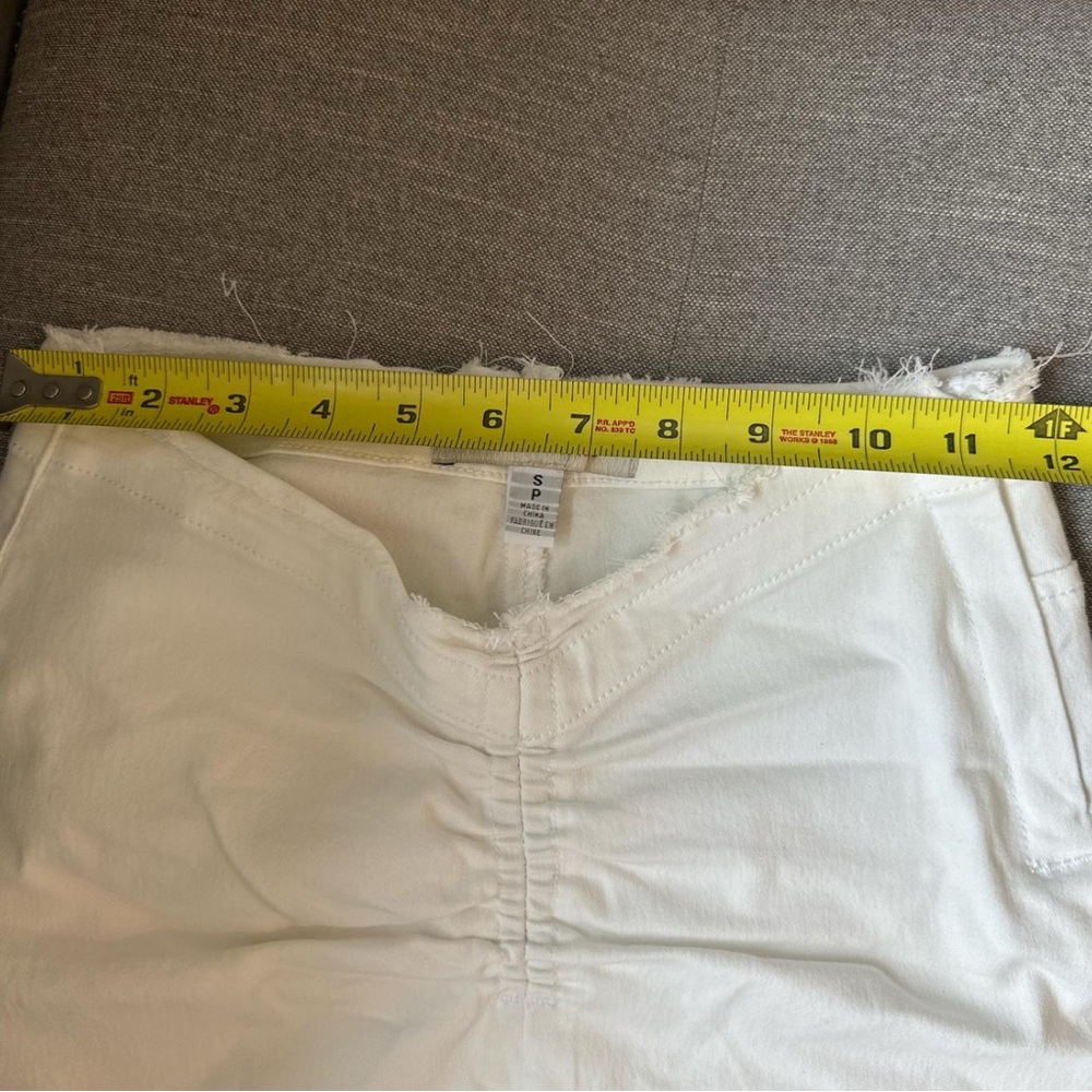 Urban Outfitters white ruched denim distressed mini skirt